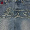 Distressed Running Dog Denim-Hose für Damen