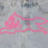Jeanshose mit „Running Dog“-Motiv und doppeltem Bund